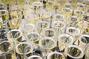 Glasses filled with champagne - celebration concept