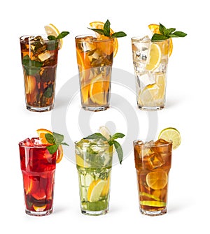 Glasses of fruit drinks with ice cubes