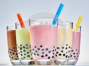 Glasses of fruity bubble tea with tapioca balls