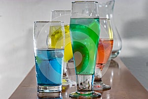 Glasses full of ice cold drinks photo