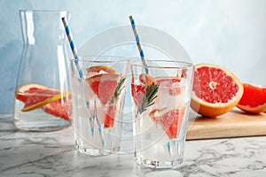 Glasses of infused water with grapefruit slices