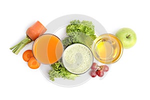 Glasses of juices, fresh fruits and vegetables on white background, top view