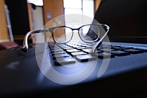 Glasses on keyboard