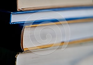 Glasses lie on a stack of books, science
