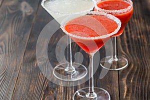 Glasses of lime and strawberry margarita cocktail