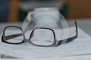 Glasses on manuscripts - close-up