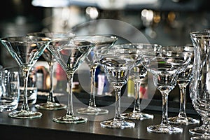 Glasses for a margarita, martini, grog and liqueur in a bar