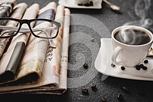 Glasses and newspaper