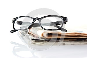 Glasses and newspapers