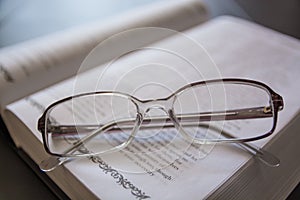 Glasses on the Open Book.