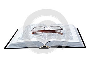 Glasses on the opened book