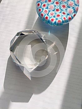 Glasses paperweights with shadows photo