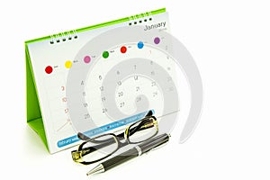 Glasses, pens, calendars photo