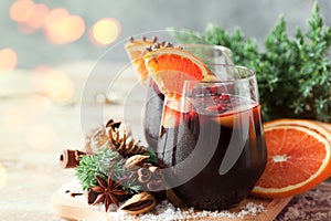 Glasses of punch for winter and Christmas with fruits and wine