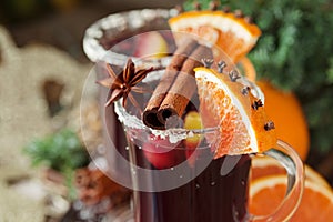 Glasses of punch for winter and Christmas with fruits and wine