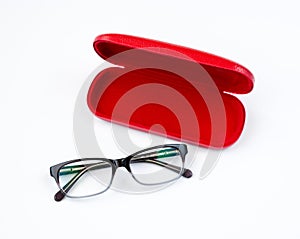 Glasses and red case on a white background