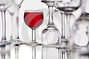 Glasses with red drink on a white background