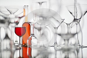 Glasses with red drink on a white background