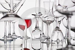 Glasses with red drink on a white background