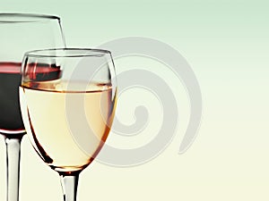 Glasses of red and white wine on light background