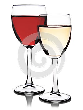 Glasses of red and white wine on white background