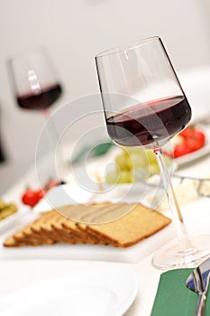 Glasses of red wine with appetiser