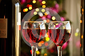 Glasses of red wine with Christmas decoration