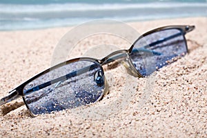 Glasses in sand