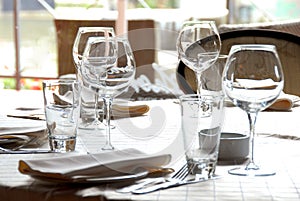 Glasses served on table in restaurant