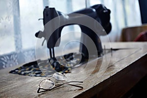 Glasses and sewing machine