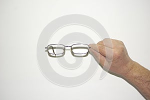 Glasses Spectacles Focusing hand Isolated.