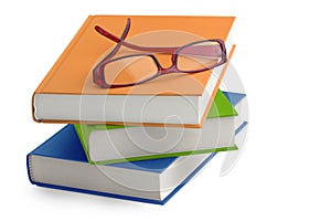 Glasses on a stack of books