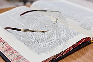 Glasses on the Talmud. Background Torah study photo