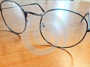 Glasses are thin lenses for the eyes to normalize and sharpen vision