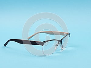 Glasses to improve vision on a blue background.