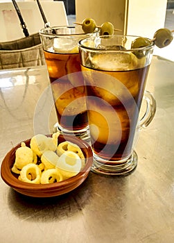 Glasses of vermouth on table in Spain