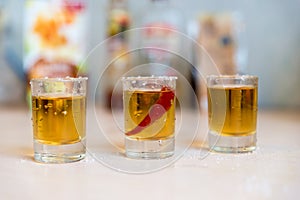 Glasses with vodka and pepper