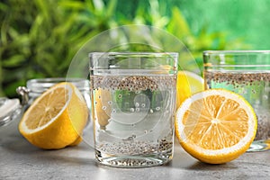 Glasses of water with chia seeds and lemon