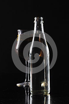Glassware Bottle Glass with Water in Studio Shot photography