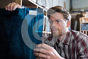 Glassworker using glass during manufacturing process