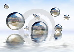 Glassy spheres floating on the water