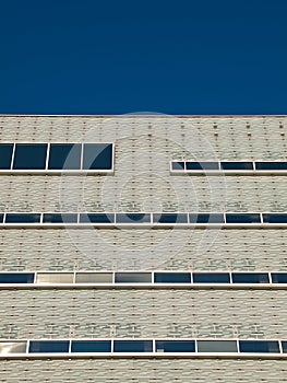 Glassy white facade.