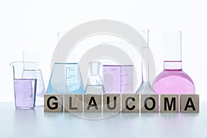 GLAUCOMA word written on a wooden cubes