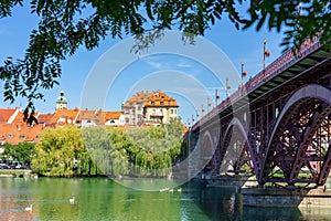 Glavni old most in Maribor with a beautiful view of the old town end lent district summer day