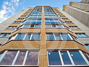 Glazed balconies of new modern high-rise building