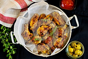 Glazed chicken drumsticks and wings