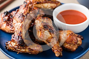 Glazed chicken wings with spice chillies sauce