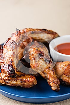 Glazed chicken wings with spice chillies sauce