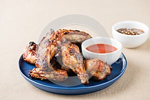 Glazed chicken wings with spice chillies sauce