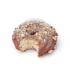 Glazed donut with milk chocolate and nutmeg. View from a forty-five degree angle. Isolated image